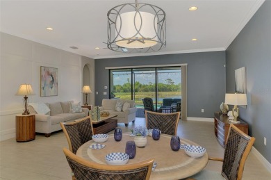 Stunning Waterfront WCI Grand Cayman in Sarasota National Lake on Sarasota National Golf Club in Florida - for sale on GolfHomes.com, golf home, golf lot