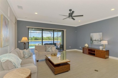 Stunning Waterfront WCI Grand Cayman in Sarasota National Lake on Sarasota National Golf Club in Florida - for sale on GolfHomes.com, golf home, golf lot