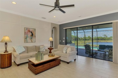 Stunning Waterfront WCI Grand Cayman in Sarasota National Lake on Sarasota National Golf Club in Florida - for sale on GolfHomes.com, golf home, golf lot