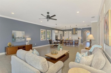 Stunning Waterfront WCI Grand Cayman in Sarasota National Lake on Sarasota National Golf Club in Florida - for sale on GolfHomes.com, golf home, golf lot