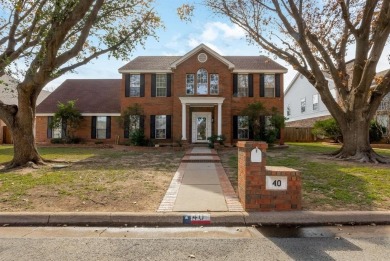 Come and explore this stunning brick residence in Fairway Oaks on Abilene Country Club - South Course in Texas - for sale on GolfHomes.com, golf home, golf lot
