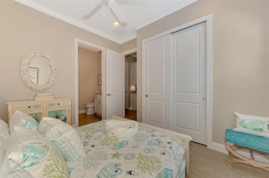 Stunning Waterfront WCI Grand Cayman in Sarasota National Lake on Sarasota National Golf Club in Florida - for sale on GolfHomes.com, golf home, golf lot