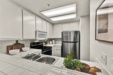 Welcome to 2960 Champion Way #1407, a Move-In Ready Condo on Tustin Ranch Golf Club in California - for sale on GolfHomes.com, golf home, golf lot