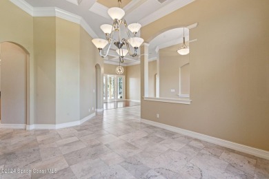 This stunning executive home exudes modern elegance and boasts on Baytree National Golf Links in Florida - for sale on GolfHomes.com, golf home, golf lot