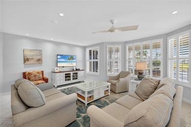 Morning light floods the beautiful window lined sunroom of this on Captiva Island Golf Club in Florida - for sale on GolfHomes.com, golf home, golf lot