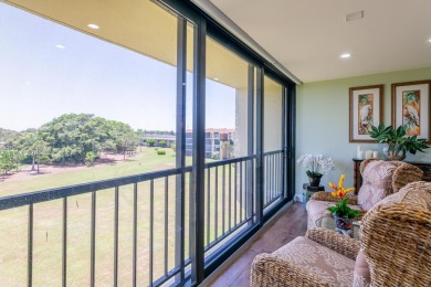 Welcome to the fabulous & updated 2-bedroom, 2-bath condo in the on BallenIsles Golf and Country Club in Florida - for sale on GolfHomes.com, golf home, golf lot