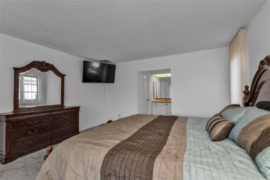 A true boater's dream, nestled just steps from the open waters on Saint Andrews South Golf Club in Florida - for sale on GolfHomes.com, golf home, golf lot