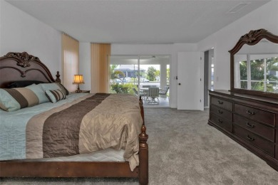 A true boater's dream, nestled just steps from the open waters on Saint Andrews South Golf Club in Florida - for sale on GolfHomes.com, golf home, golf lot
