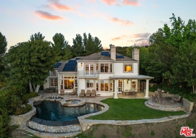 Welcome to a breathtaking retreat nestled within the exclusive on Calabasas Golf and Country Club in California - for sale on GolfHomes.com, golf home, golf lot