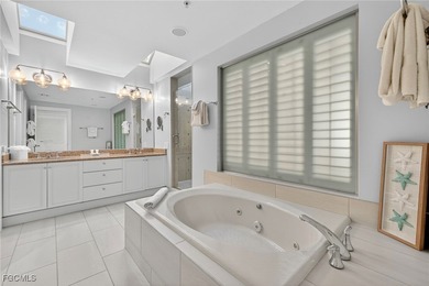 Morning light floods the beautiful window lined sunroom of this on Captiva Island Golf Club in Florida - for sale on GolfHomes.com, golf home, golf lot