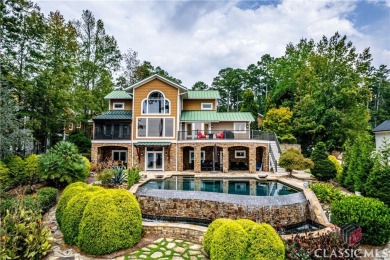 Discover luxurious lakefront living with this stunning custom on Reynolds Lake Oconee - The Oconee in Georgia - for sale on GolfHomes.com, golf home, golf lot