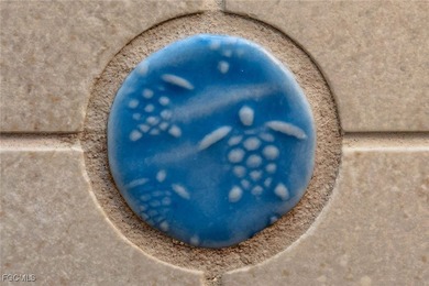 Morning light floods the beautiful window lined sunroom of this on Captiva Island Golf Club in Florida - for sale on GolfHomes.com, golf home, golf lot