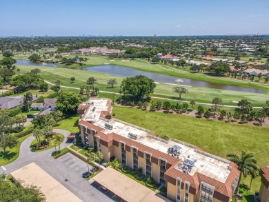 Welcome to the fabulous & updated 2-bedroom, 2-bath condo in the on BallenIsles Golf and Country Club in Florida - for sale on GolfHomes.com, golf home, golf lot