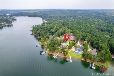 Discover luxurious lakefront living with this stunning custom on Reynolds Lake Oconee - The Oconee in Georgia - for sale on GolfHomes.com, golf home, golf lot