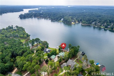 Discover luxurious lakefront living with this stunning custom on Reynolds Lake Oconee - The Oconee in Georgia - for sale on GolfHomes.com, golf home, golf lot