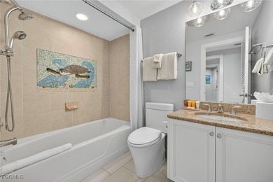 Morning light floods the beautiful window lined sunroom of this on Captiva Island Golf Club in Florida - for sale on GolfHomes.com, golf home, golf lot