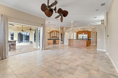 This stunning executive home exudes modern elegance and boasts on Baytree National Golf Links in Florida - for sale on GolfHomes.com, golf home, golf lot