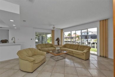 A true boater's dream, nestled just steps from the open waters on Saint Andrews South Golf Club in Florida - for sale on GolfHomes.com, golf home, golf lot