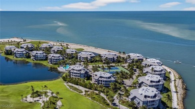 Morning light floods the beautiful window lined sunroom of this on Captiva Island Golf Club in Florida - for sale on GolfHomes.com, golf home, golf lot