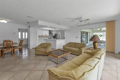 A true boater's dream, nestled just steps from the open waters on Saint Andrews South Golf Club in Florida - for sale on GolfHomes.com, golf home, golf lot