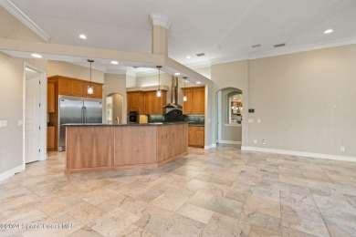 This stunning executive home exudes modern elegance and boasts on Baytree National Golf Links in Florida - for sale on GolfHomes.com, golf home, golf lot