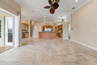 This stunning executive home exudes modern elegance and boasts on Baytree National Golf Links in Florida - for sale on GolfHomes.com, golf home, golf lot