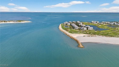 Morning light floods the beautiful window lined sunroom of this on Captiva Island Golf Club in Florida - for sale on GolfHomes.com, golf home, golf lot