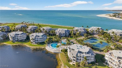 Morning light floods the beautiful window lined sunroom of this on Captiva Island Golf Club in Florida - for sale on GolfHomes.com, golf home, golf lot
