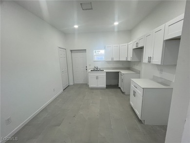 Welcome to this modern 2-bedroom, 1-bathroom new construction on River Hall Country Club in Florida - for sale on GolfHomes.com, golf home, golf lot