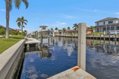 A true boater's dream, nestled just steps from the open waters on Saint Andrews South Golf Club in Florida - for sale on GolfHomes.com, golf home, golf lot