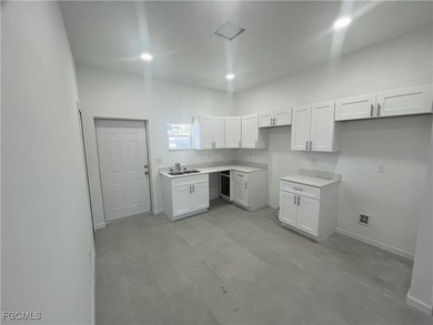 Welcome to this modern 2-bedroom, 1-bathroom new construction on River Hall Country Club in Florida - for sale on GolfHomes.com, golf home, golf lot