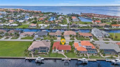 A true boater's dream, nestled just steps from the open waters on Saint Andrews South Golf Club in Florida - for sale on GolfHomes.com, golf home, golf lot