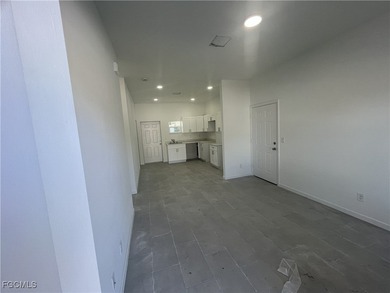 Welcome to this modern 2-bedroom, 1-bathroom new construction on River Hall Country Club in Florida - for sale on GolfHomes.com, golf home, golf lot