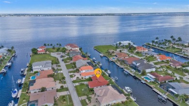 A true boater's dream, nestled just steps from the open waters on Saint Andrews South Golf Club in Florida - for sale on GolfHomes.com, golf home, golf lot