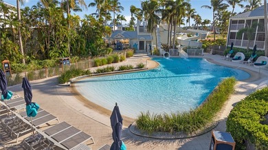 Morning light floods the beautiful window lined sunroom of this on Captiva Island Golf Club in Florida - for sale on GolfHomes.com, golf home, golf lot