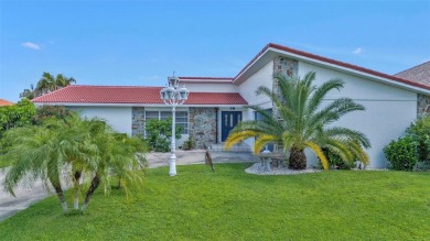 A true boater's dream, nestled just steps from the open waters on Saint Andrews South Golf Club in Florida - for sale on GolfHomes.com, golf home, golf lot