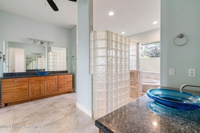 This stunning executive home exudes modern elegance and boasts on Baytree National Golf Links in Florida - for sale on GolfHomes.com, golf home, golf lot