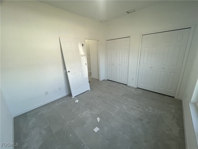 Welcome to this modern 2-bedroom, 1-bathroom new construction on River Hall Country Club in Florida - for sale on GolfHomes.com, golf home, golf lot