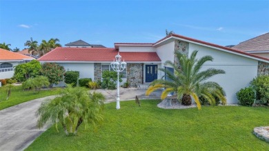 A true boater's dream, nestled just steps from the open waters on Saint Andrews South Golf Club in Florida - for sale on GolfHomes.com, golf home, golf lot
