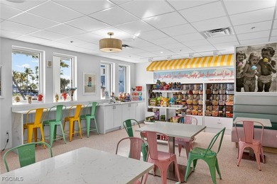 Morning light floods the beautiful window lined sunroom of this on Captiva Island Golf Club in Florida - for sale on GolfHomes.com, golf home, golf lot