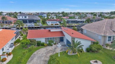 A true boater's dream, nestled just steps from the open waters on Saint Andrews South Golf Club in Florida - for sale on GolfHomes.com, golf home, golf lot