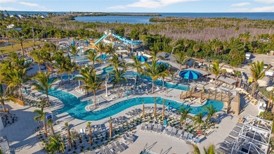 Morning light floods the beautiful window lined sunroom of this on Captiva Island Golf Club in Florida - for sale on GolfHomes.com, golf home, golf lot
