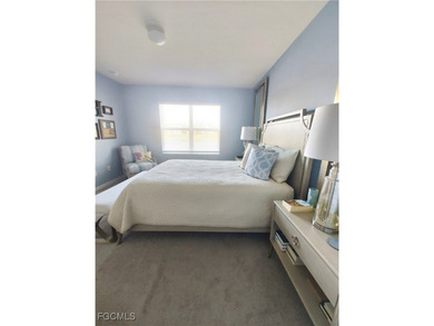 Welcome to your lakeview villa with attached garage. Storage on Herons Glen Golf and Country Club in Florida - for sale on GolfHomes.com, golf home, golf lot