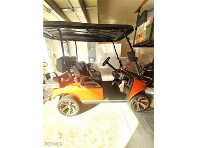 Welcome to your lakeview villa with attached garage. Storage on Herons Glen Golf and Country Club in Florida - for sale on GolfHomes.com, golf home, golf lot