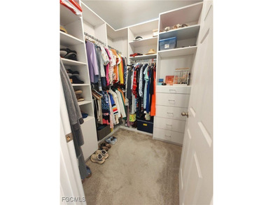 Welcome to your lakeview villa with attached garage. Storage on Herons Glen Golf and Country Club in Florida - for sale on GolfHomes.com, golf home, golf lot