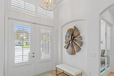 Experience elevated modern living in this impeccably upgraded on Heritage Landing Golf  in Florida - for sale on GolfHomes.com, golf home, golf lot