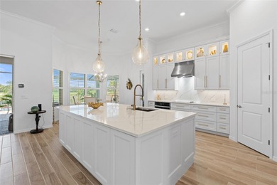 Experience elevated modern living in this impeccably upgraded on Heritage Landing Golf  in Florida - for sale on GolfHomes.com, golf home, golf lot