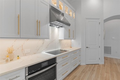 Experience elevated modern living in this impeccably upgraded on Heritage Landing Golf  in Florida - for sale on GolfHomes.com, golf home, golf lot