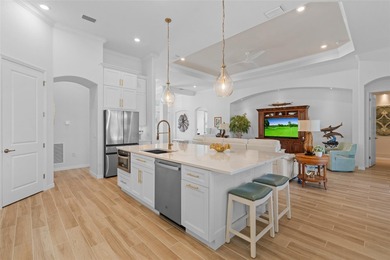 Experience elevated modern living in this impeccably upgraded on Heritage Landing Golf  in Florida - for sale on GolfHomes.com, golf home, golf lot