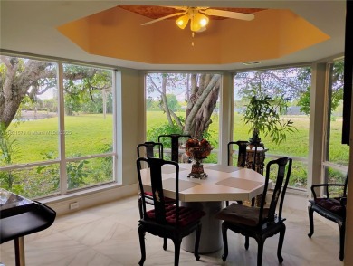 The moment you walk in, you feel it -- space, light, freedom. A on Woodlands Country Club in Florida - for sale on GolfHomes.com, golf home, golf lot